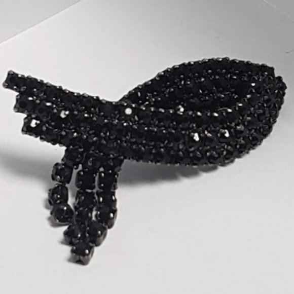 VINTAGE BLACK ONYX? RIBBON/EGYPTIAN EYE BROOCH - Picture 1 of 6